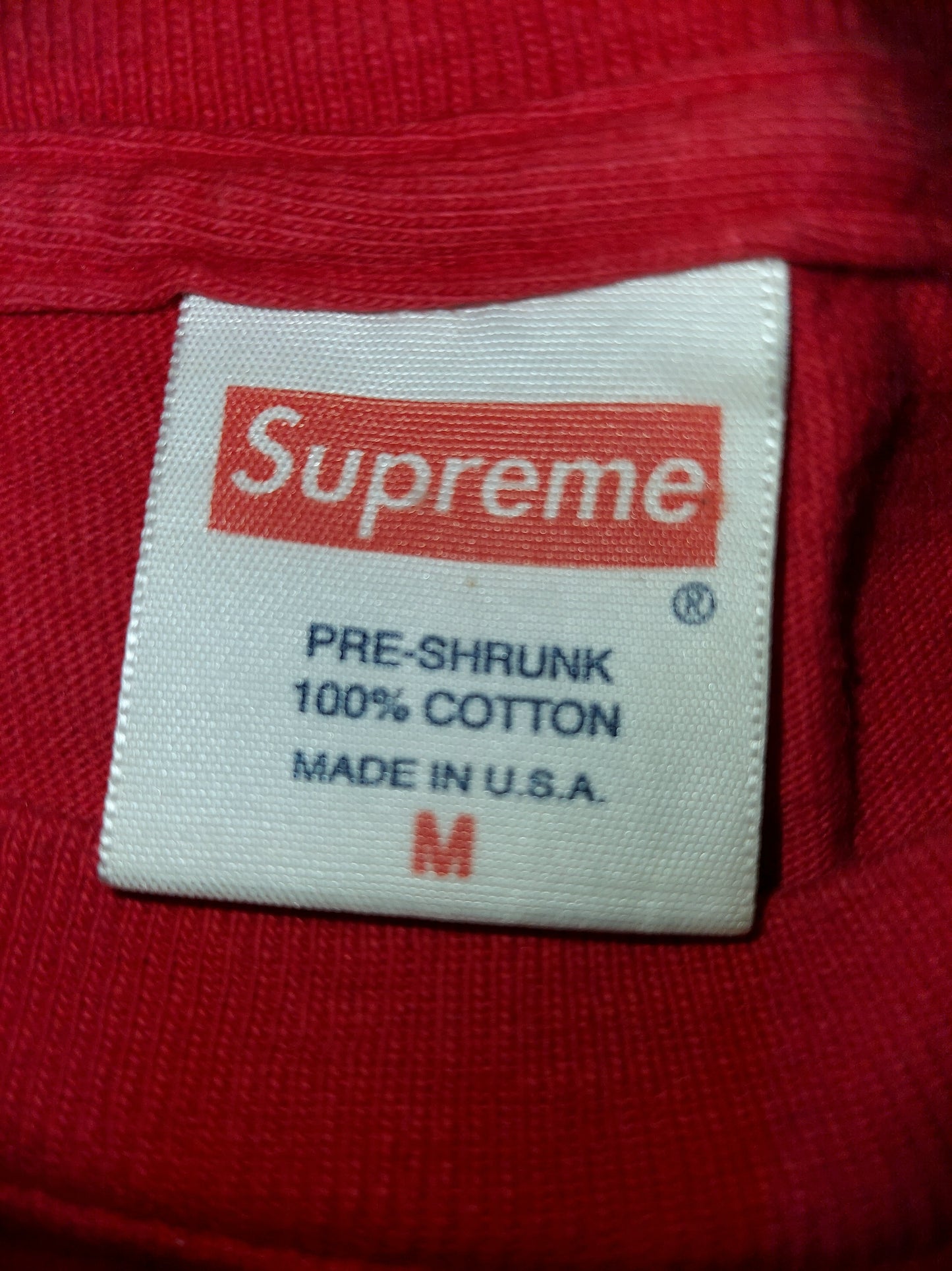Supreme T-shirt featuring vertical gradient logo print